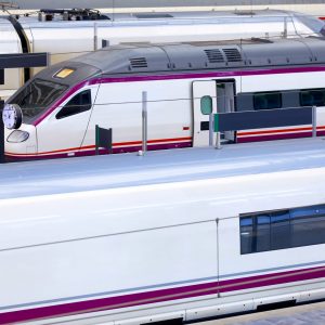 High-speed trains platforms in a railway station perspective.